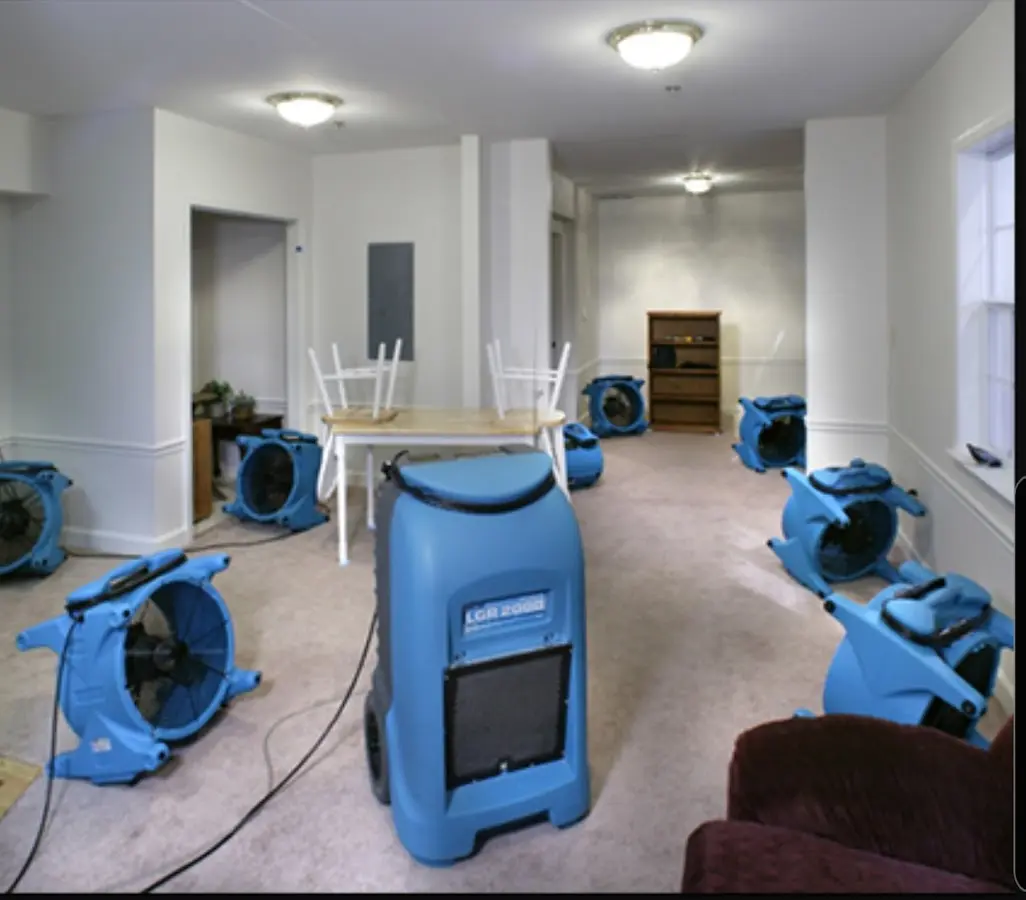 Air movers and dehumidifier setup for Water Damage Restoration in Bluefield